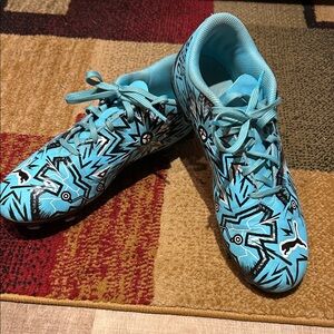 Puma Kids soccer shoes with Blue and Black Pattern